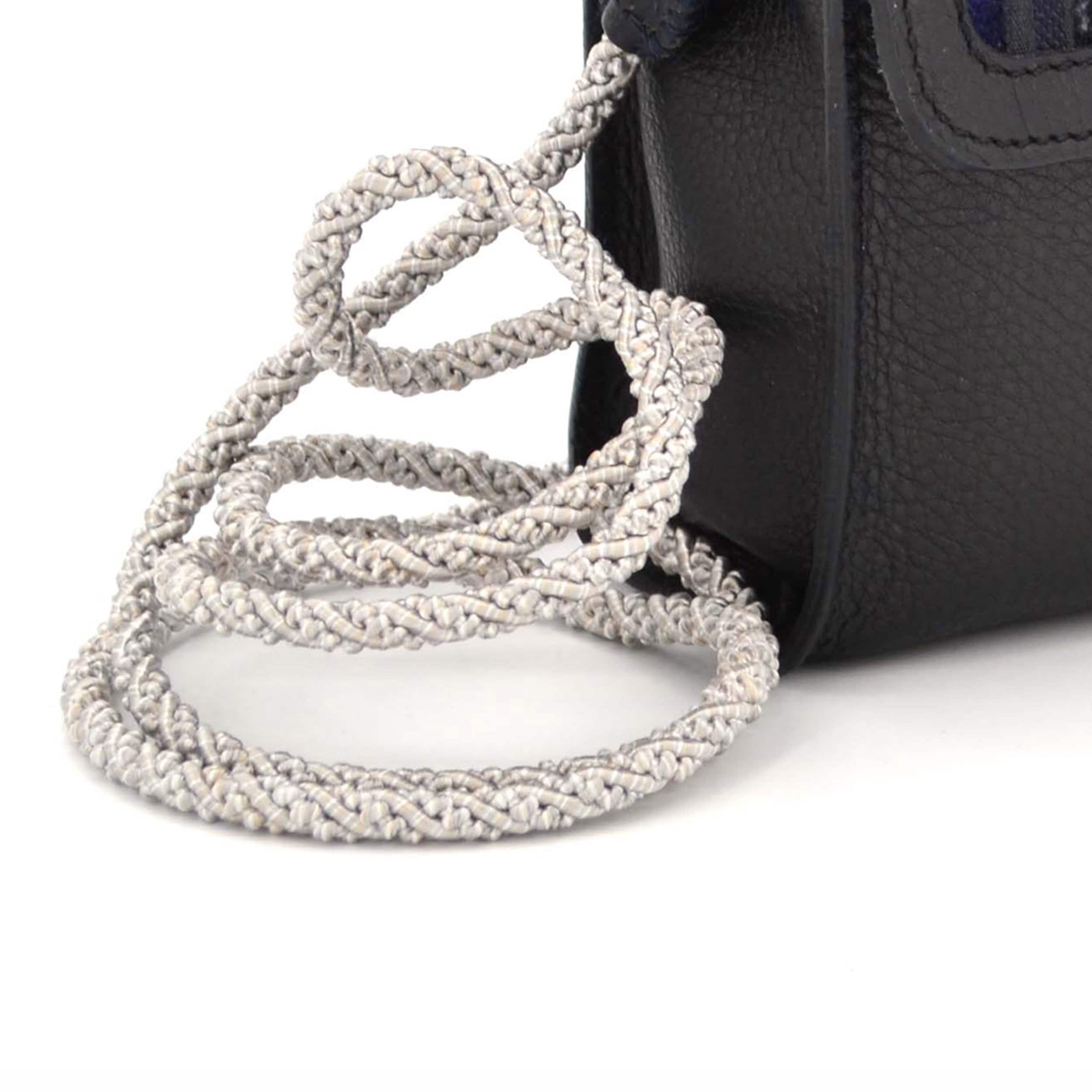 The carrier is handmade by a german traditional company, specialized in furniture supplies. This cord is made of three strand, and each one has a few colors in it, to become vivid.