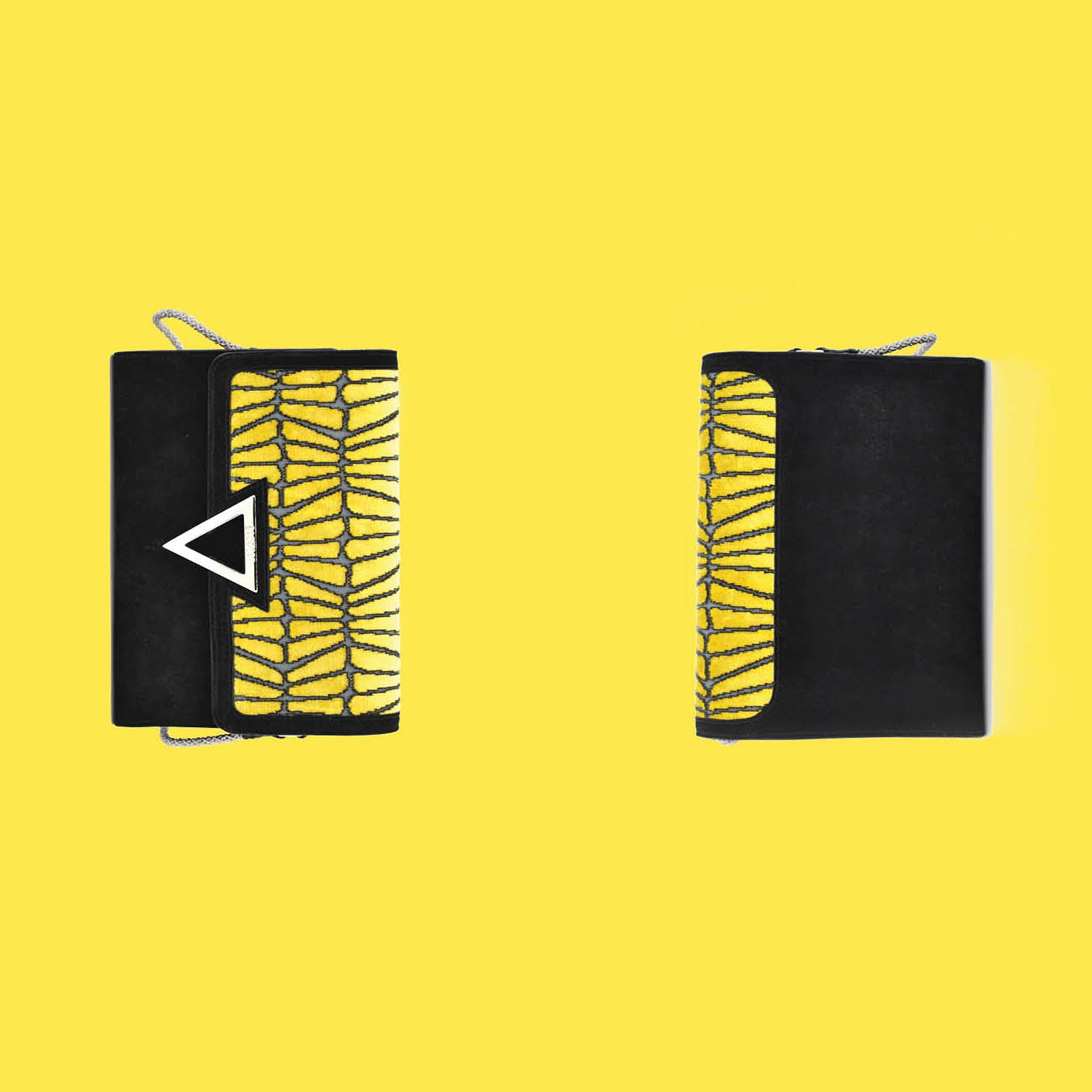 Candy Cracker purse in front of a yellow background.