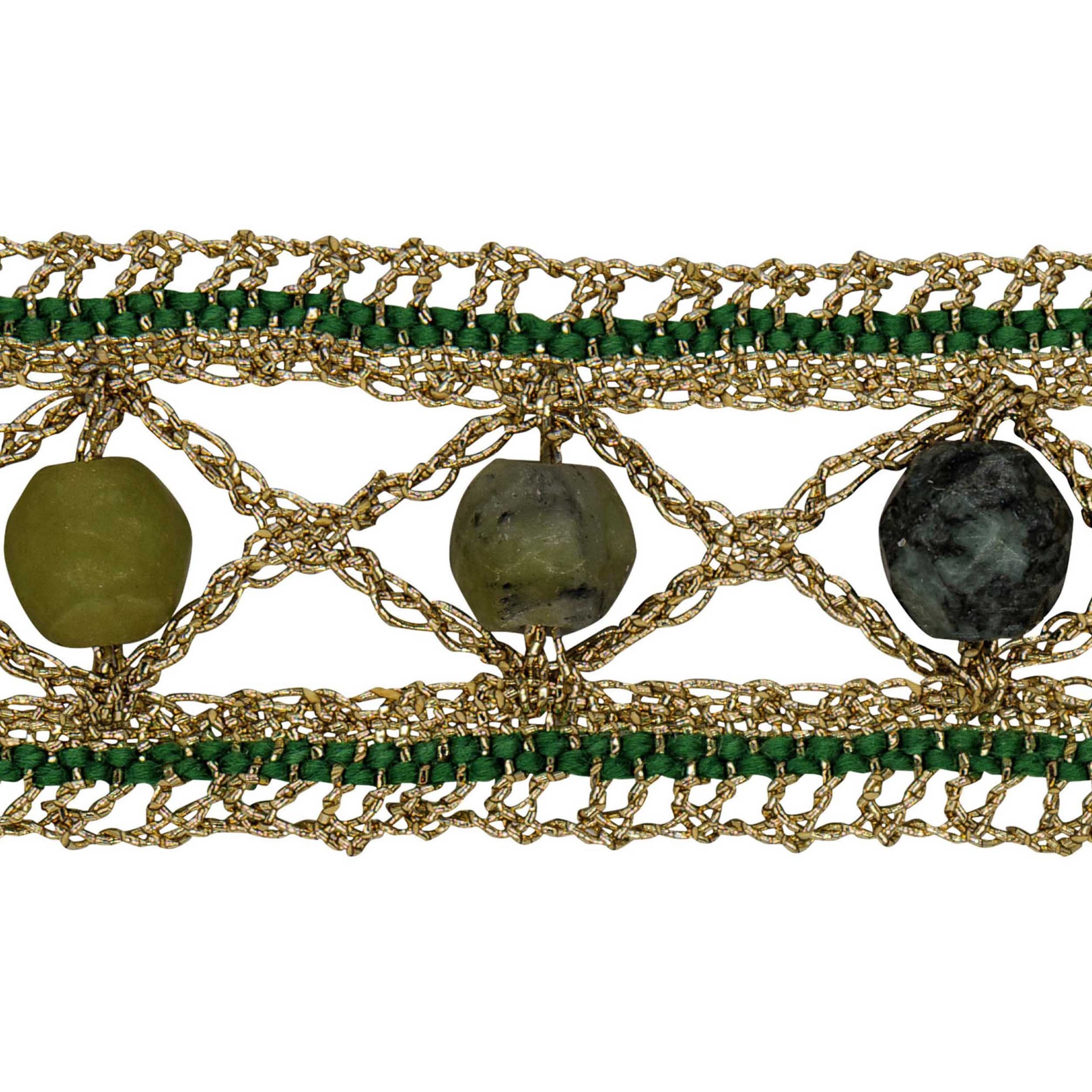 Elegant and unusual lace bracelet made from golden metal threads and high-quality Egyptian cotton. Artfully connected using a lace technique and decorated with round faceted stone beads.