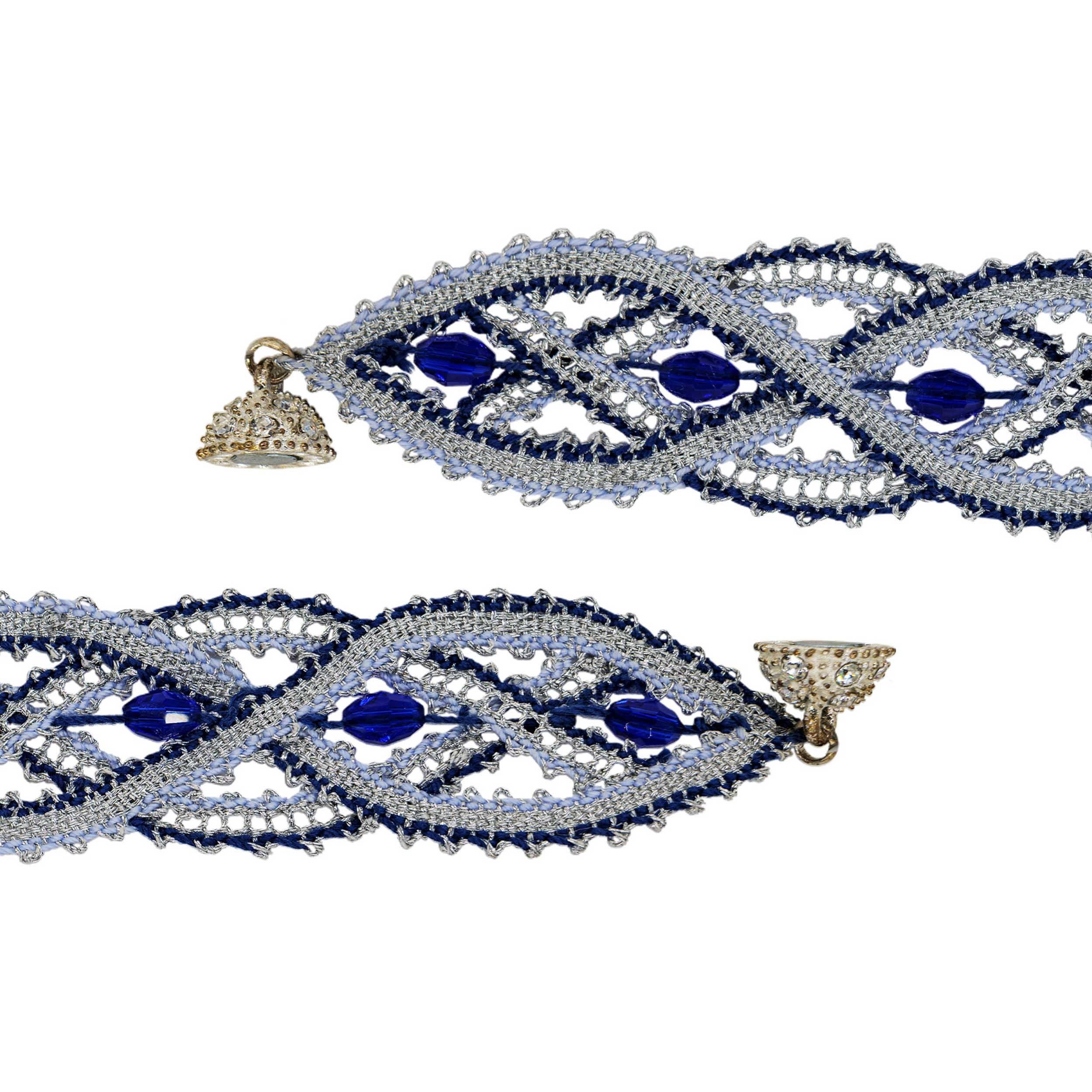 Mercerized embroidery twist and metallized lurex embellisehd with faceted bohemian glassbeads make this bracelet a real eye-catcher.