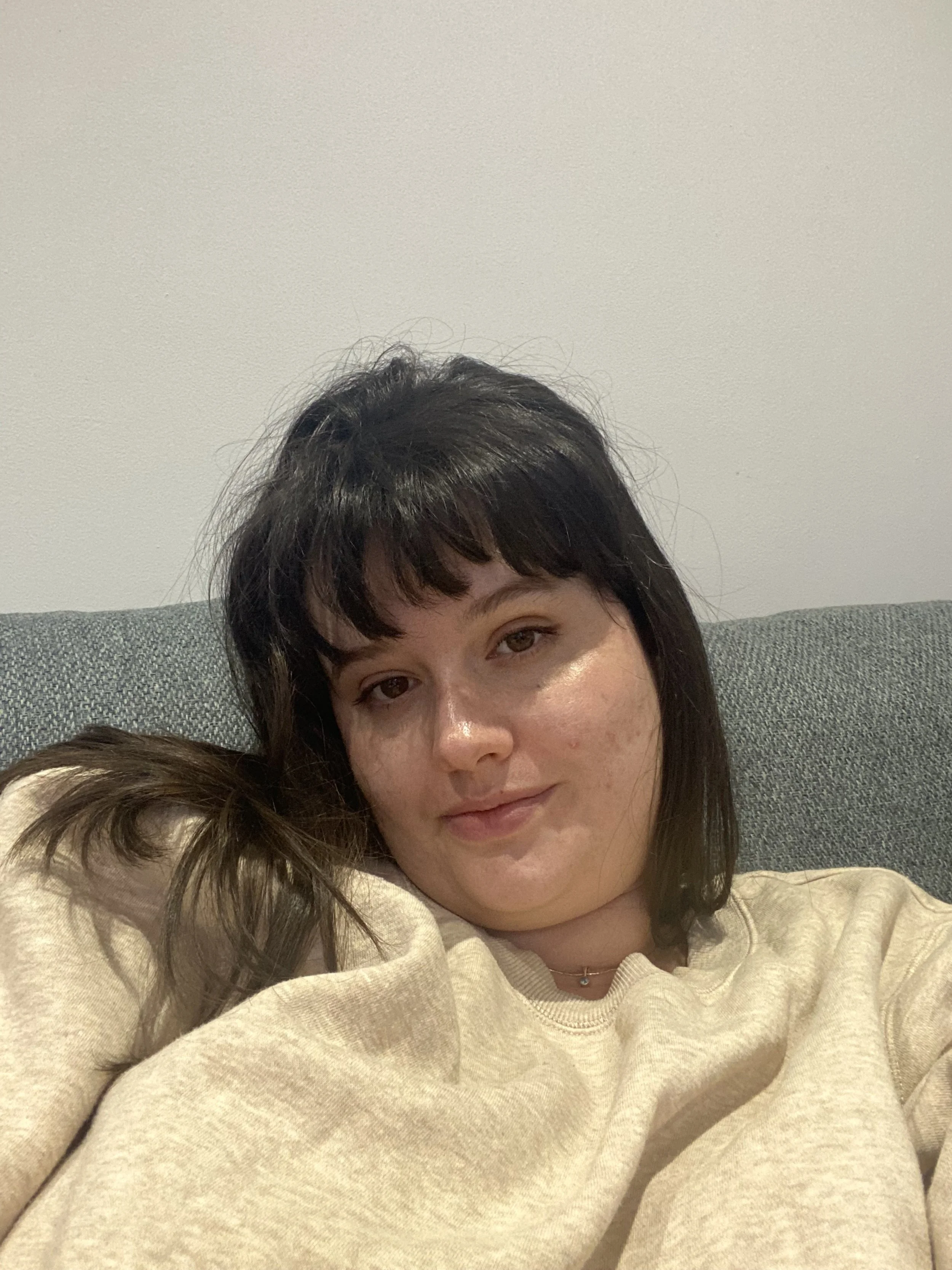 A picture of me in a fuzzy sweater