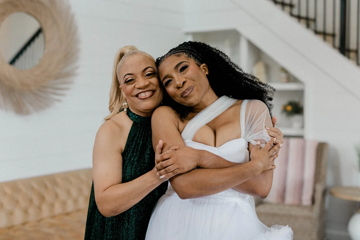 Bride hugging her mother