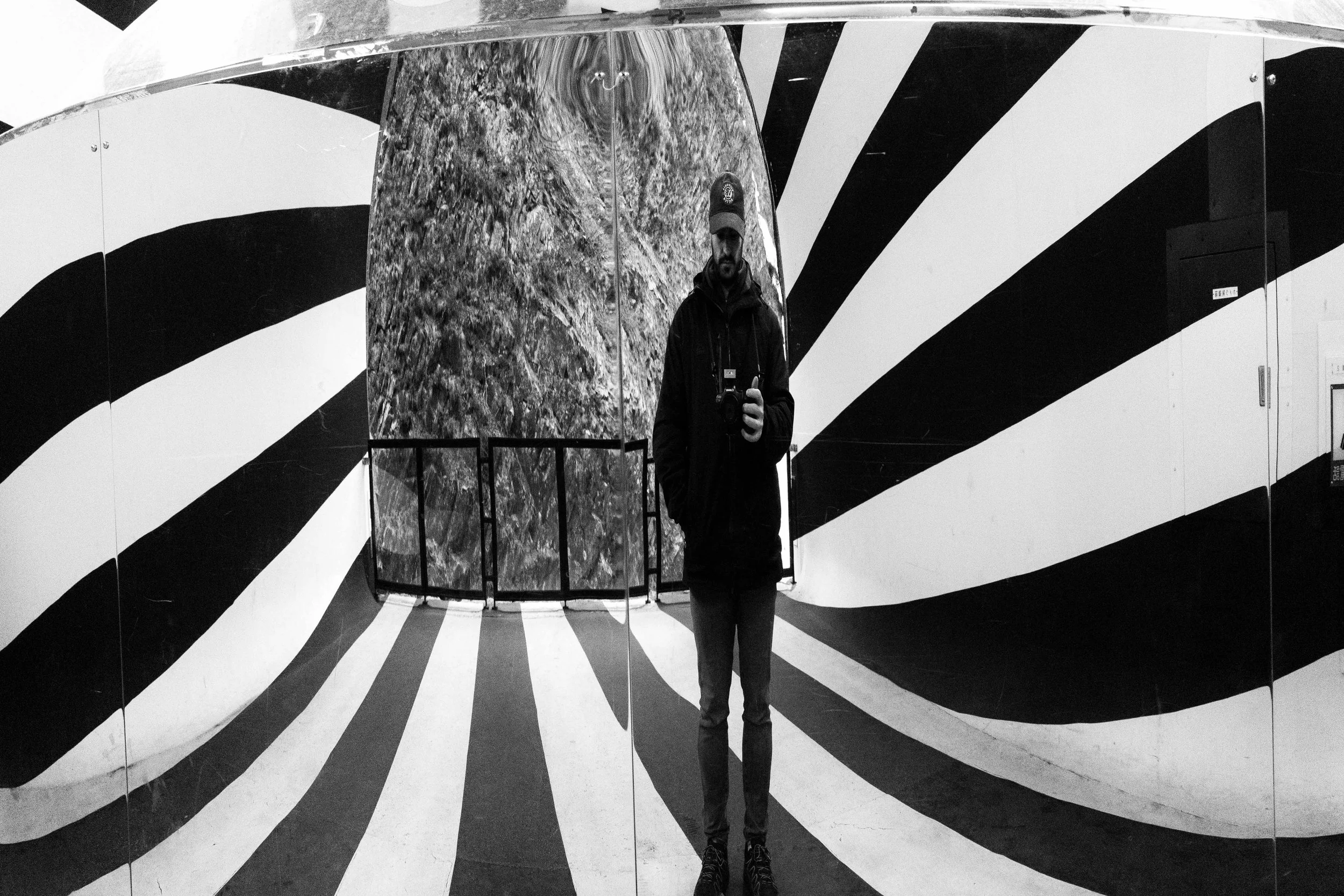Self portrait of Paolo Maschio on a curved mirror