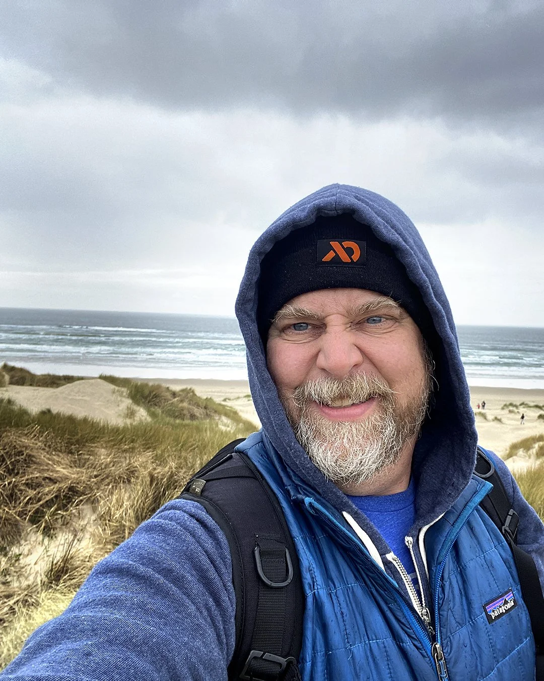 portrait of Brooks Smothers, podcast host for RV Out West, at the Oregon Coast