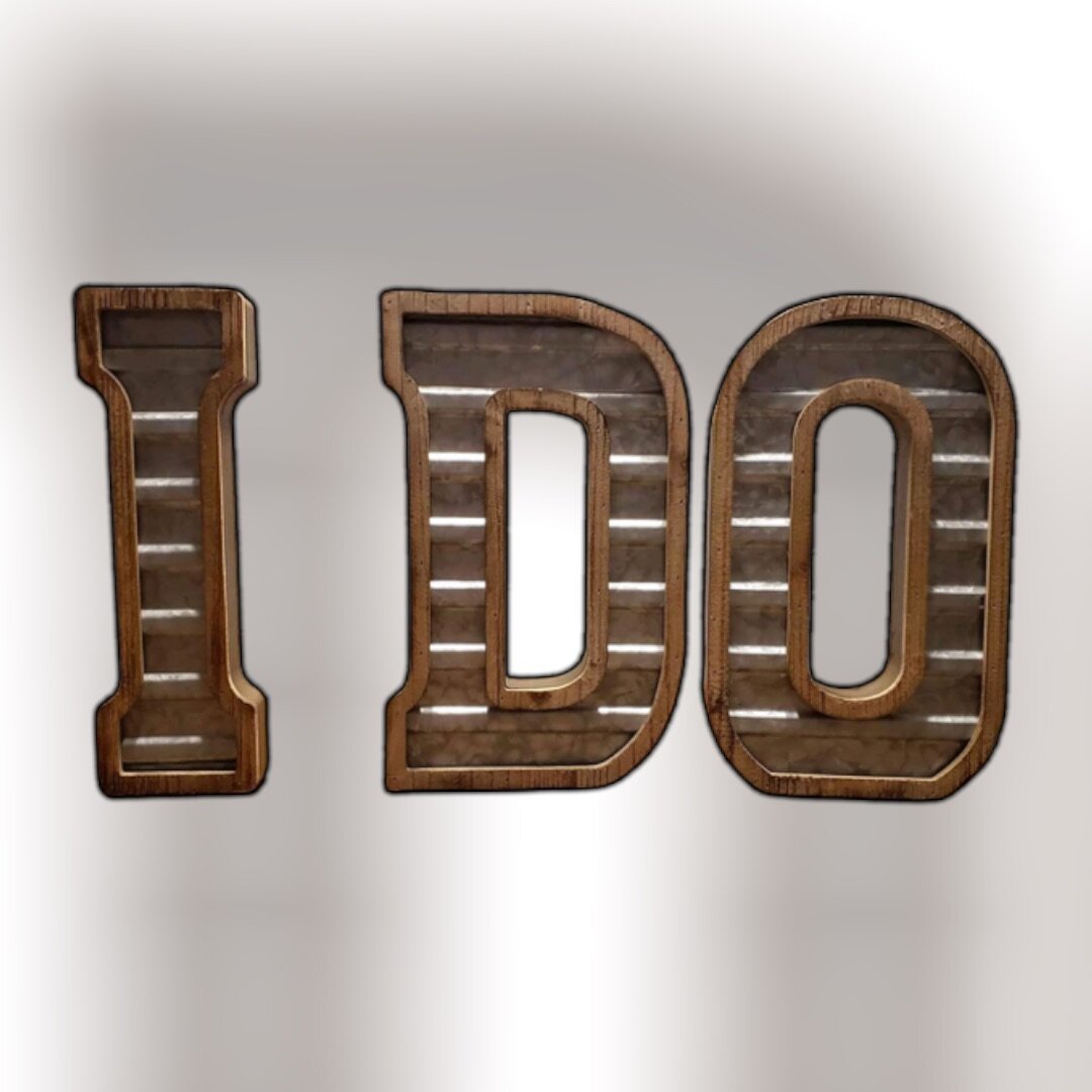 wood and galvanized letters spelling I DO
