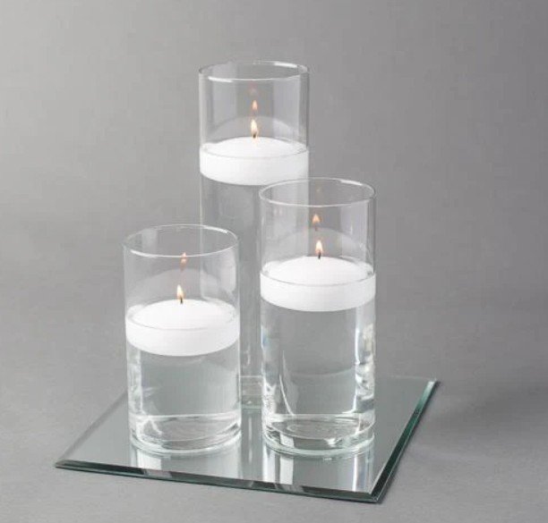 Cylinder vase trio on square 10 inch mirror.jpg
