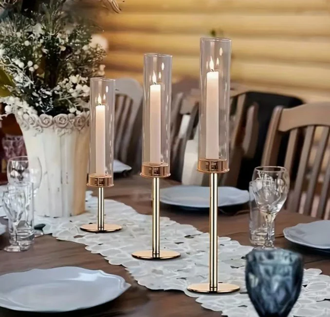 modern gold candlestick trio with hurricane shade.jpg