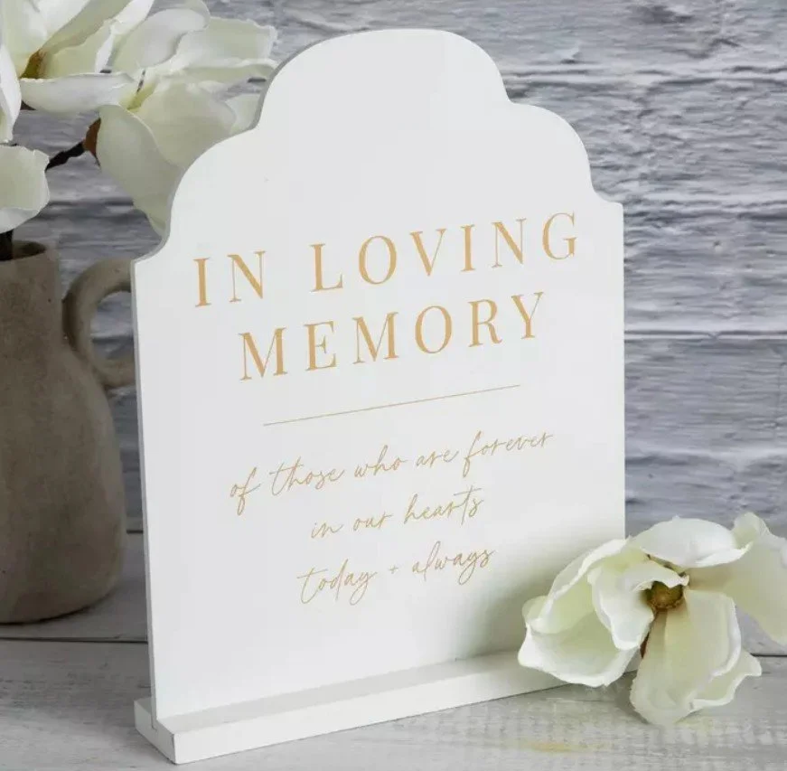In Loving Memory white and gold sign