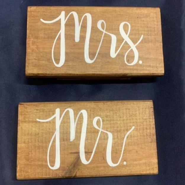 Mr and Mrs wooden signs for wedding bridal table