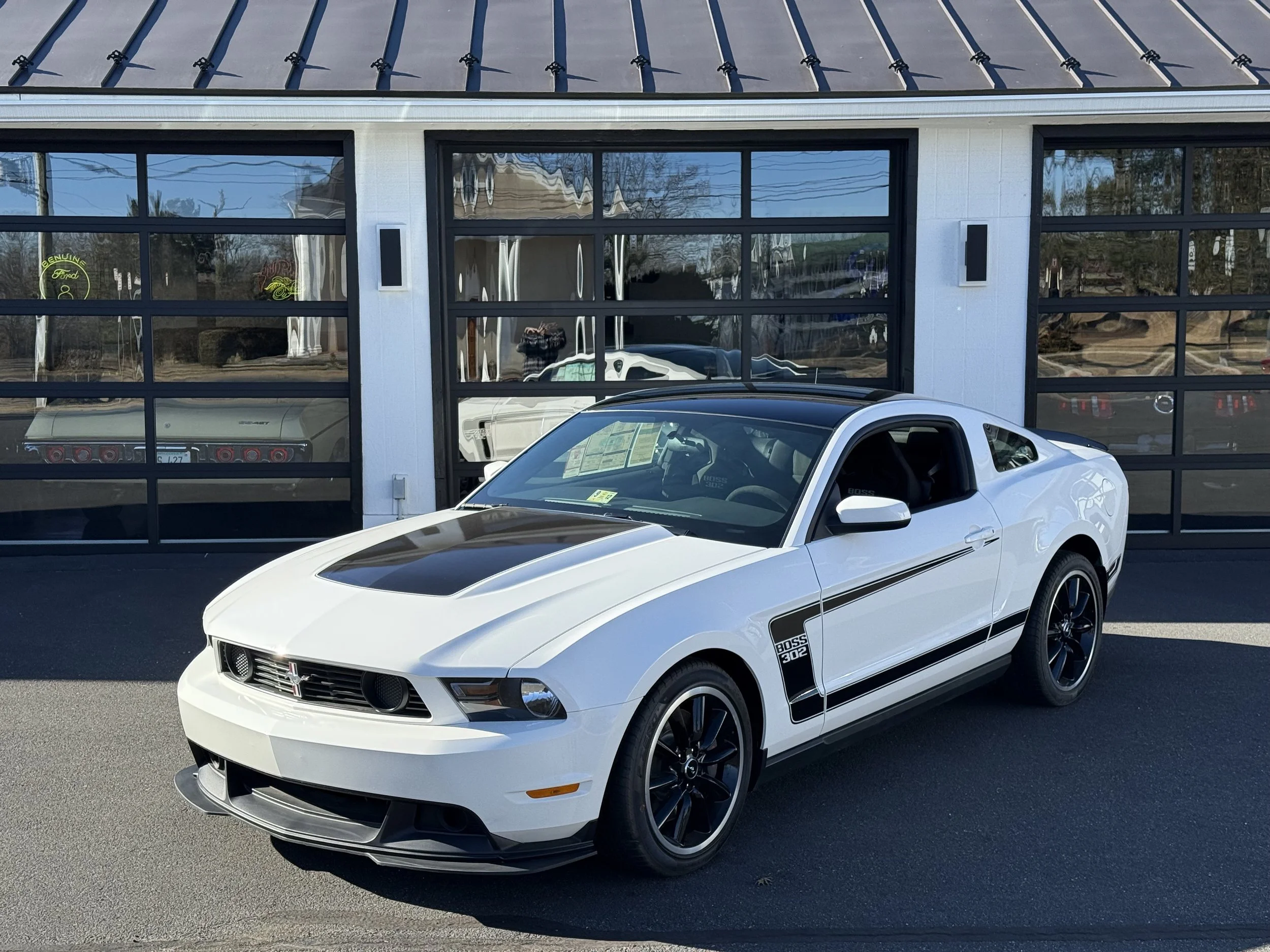 2012 Ford Mustang Boss 302 (23 miles)