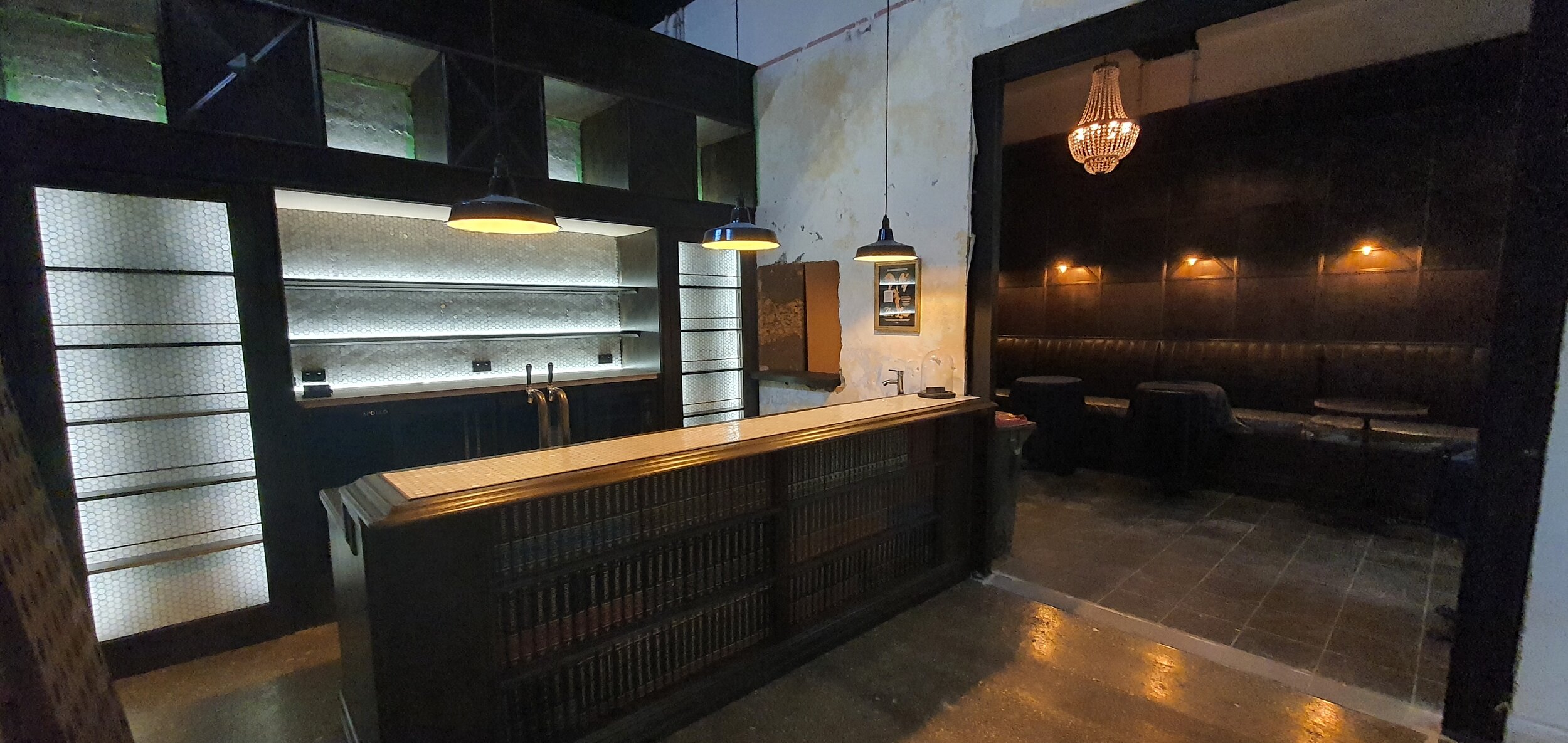 Setting the mood with a bespoke stained Oak fitout, subtle mood lighting and a clean aesthetic