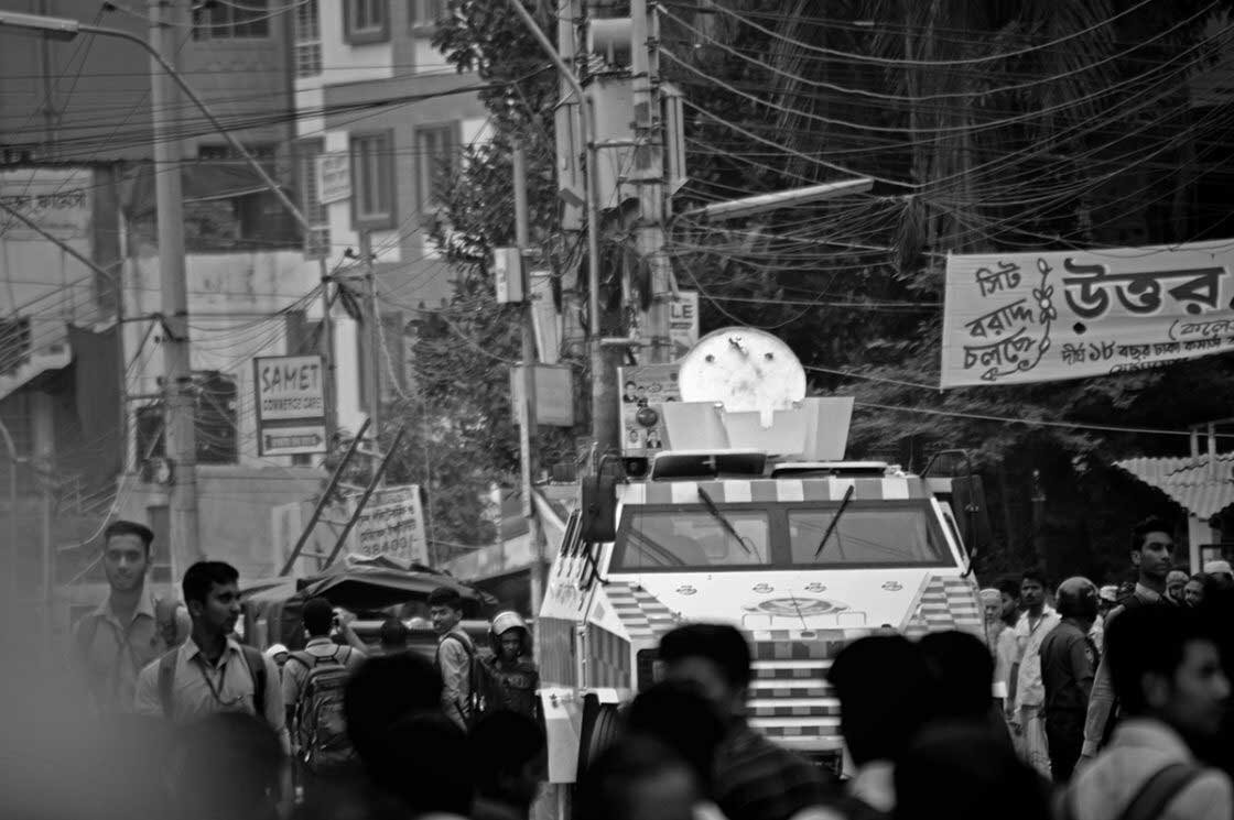   An APC (   Armoured    Personnel Carrier) armed with water cannon belonging to Dhaka Metropilitan Police stationed to counter protesters at Mirpur 1.  