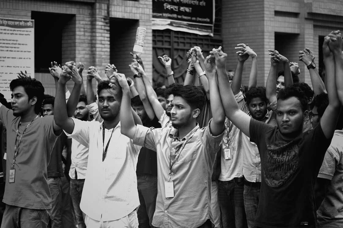   Students of Bangladesh University of Business &amp; Technology (BUBT) form a human chain in front of their campus at Mirpur 1   