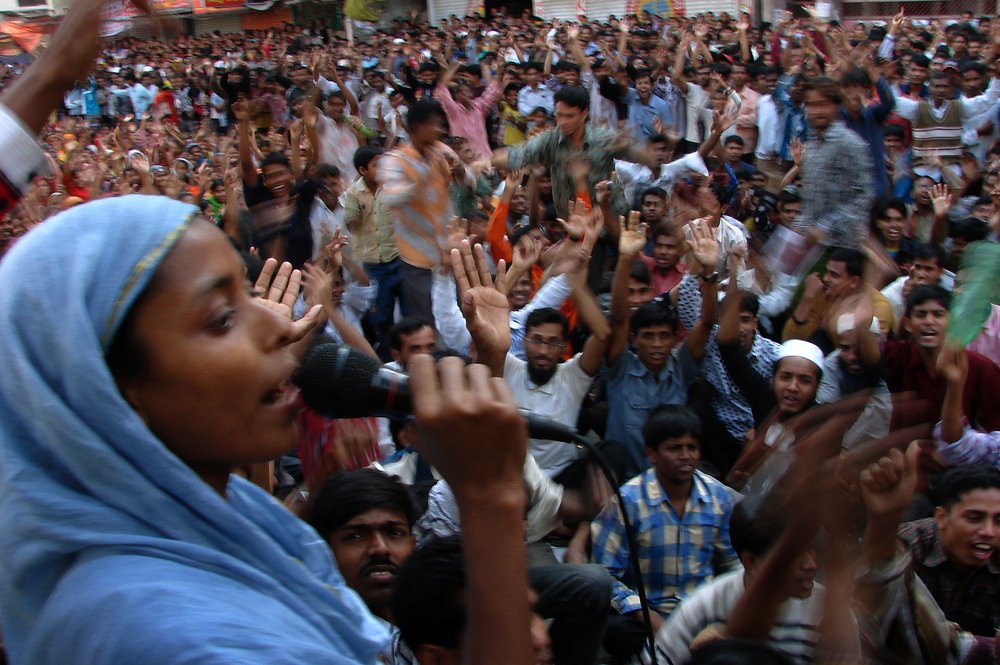   A female worker giving a speech in a protest rally. She doesn’t hesitate to raise their demands during the emergency period. 16th January 2008. Dhaka, Bangladesh.&nbsp;Image: Taslima Akhter  