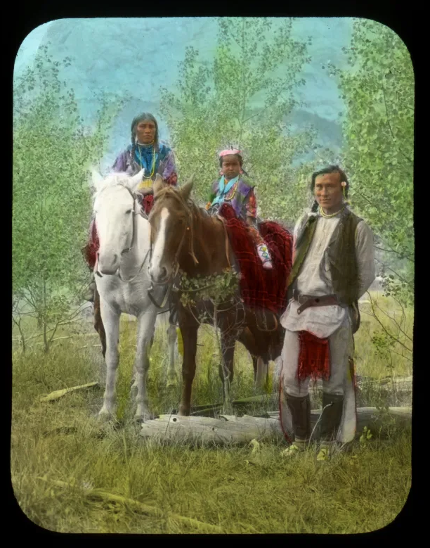   Hand-painted lantern slide by Mary Schaffer, 1906.&nbsp;“Stonies [Stoney First Nations] on Kootenai [Kootenay] Plains. Leah, Frances Louise and Sampson (sic) Beaver family.”&nbsp;In 1908, Mary Schaffer was the first non-native to visit Maligne Lake