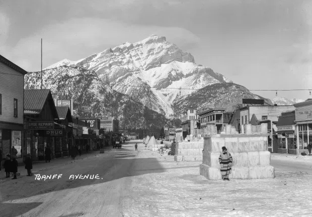  A much different Banff Avenue, during the Banff Winter Carnival, 1925.    Created by Byron Harmon. Courtesy of the Whyte Museum of the Canadian Rockies, V263 / NA – 3841  