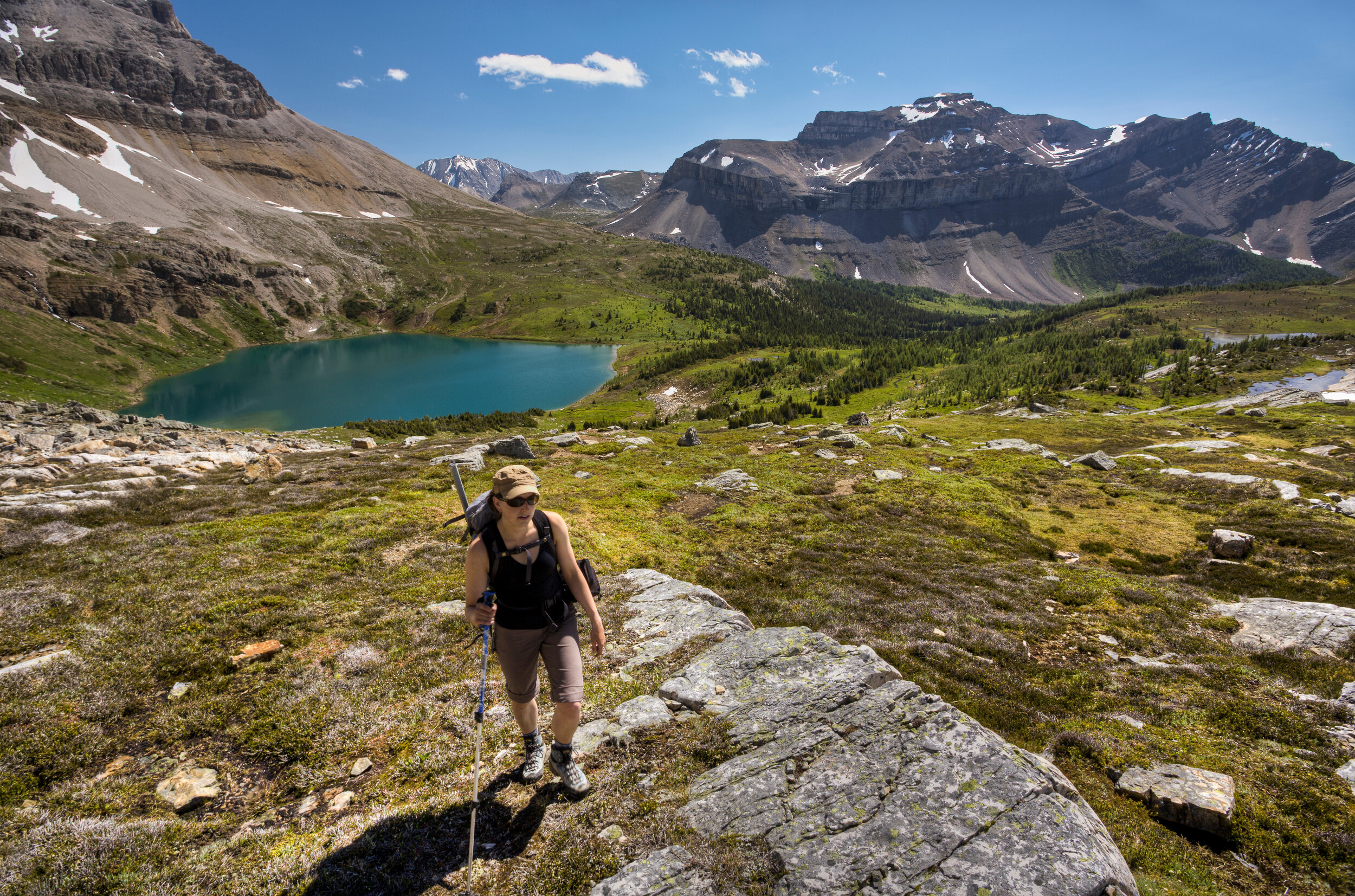  Scrambling up Mt. Richardson with Hidden Lake in the background. Photo by Paul Zizka 