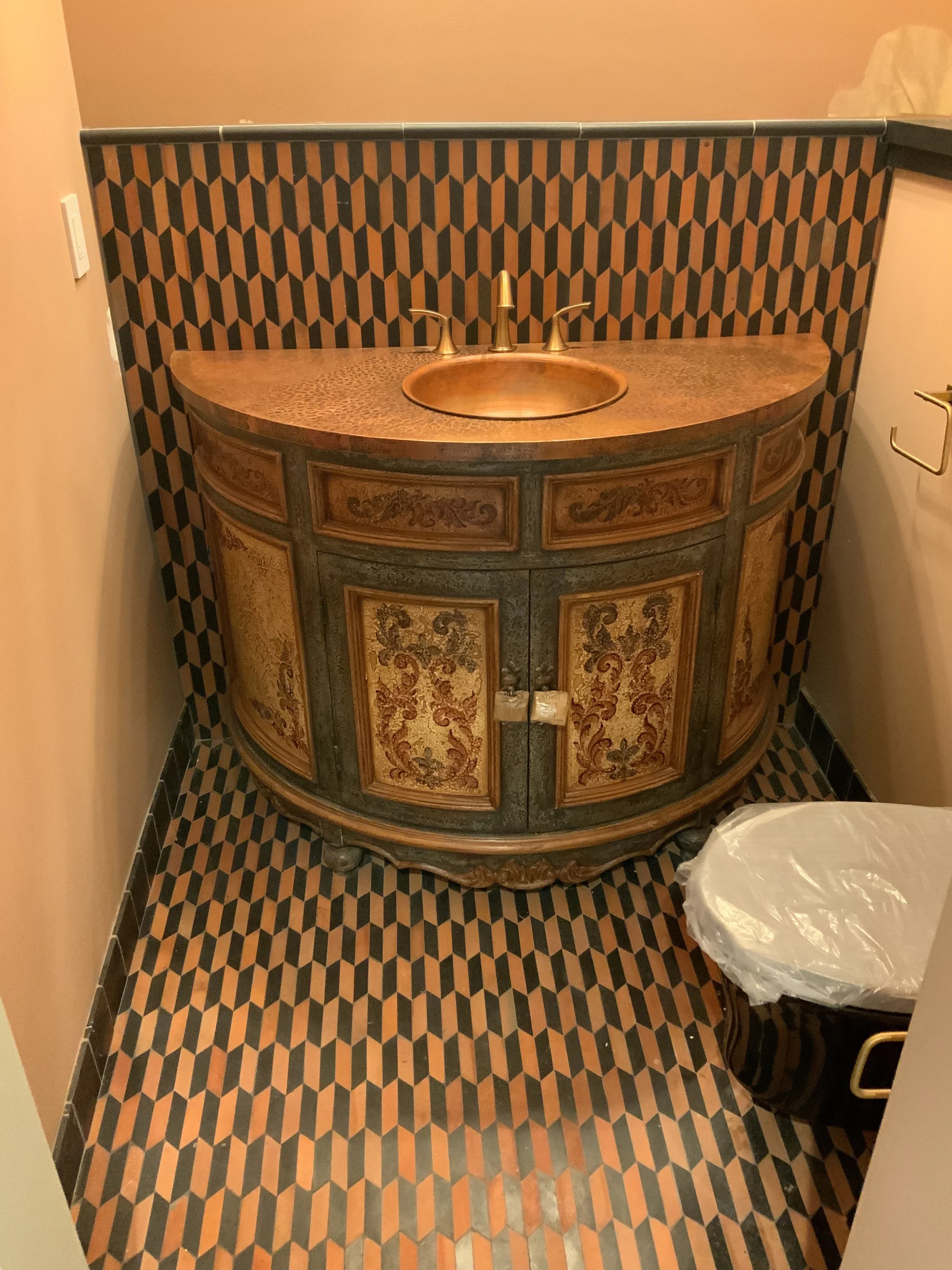 Tiled floor, wall and installed vanity