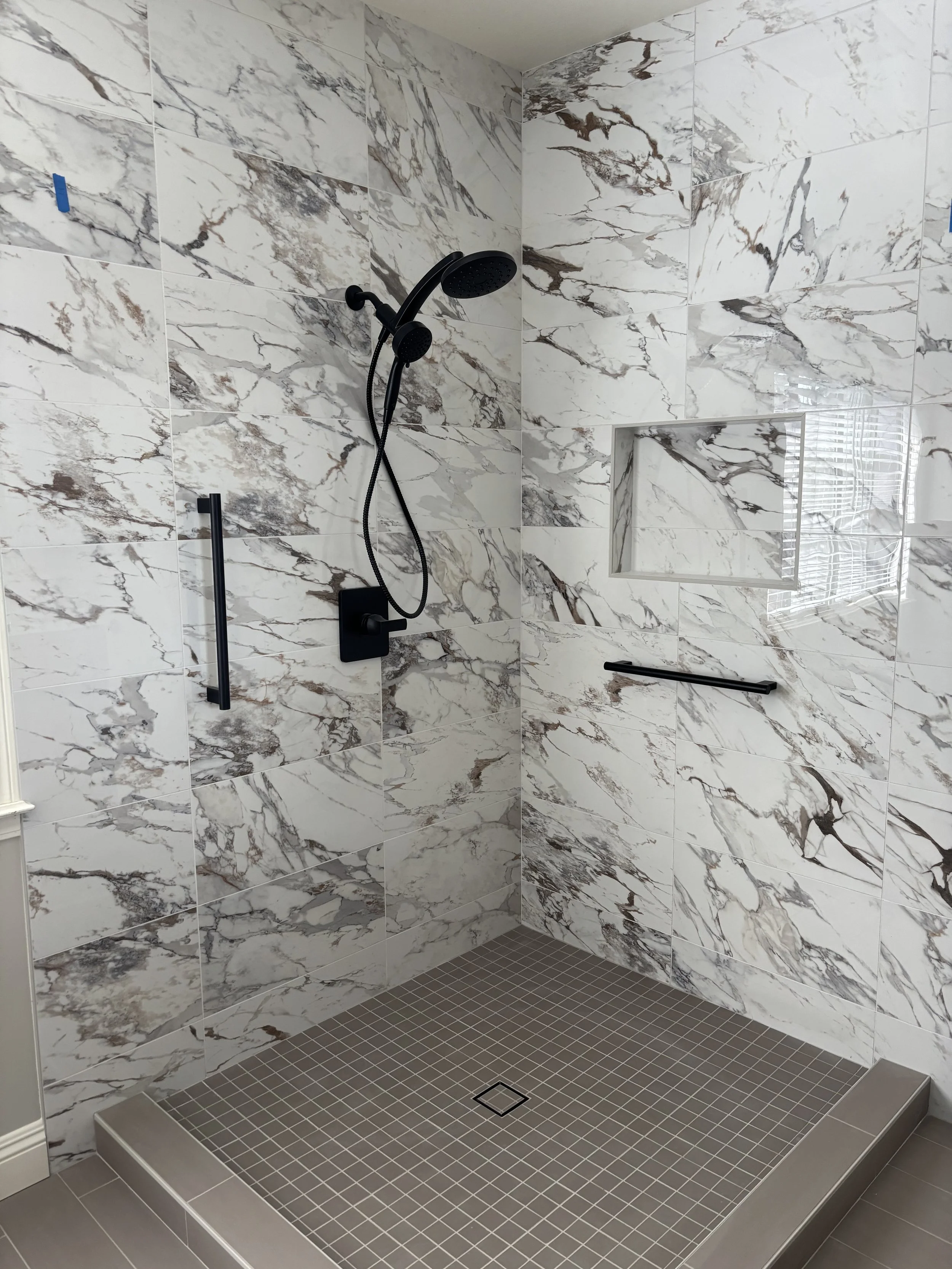 Tiled shower enclosure & shower pan. 