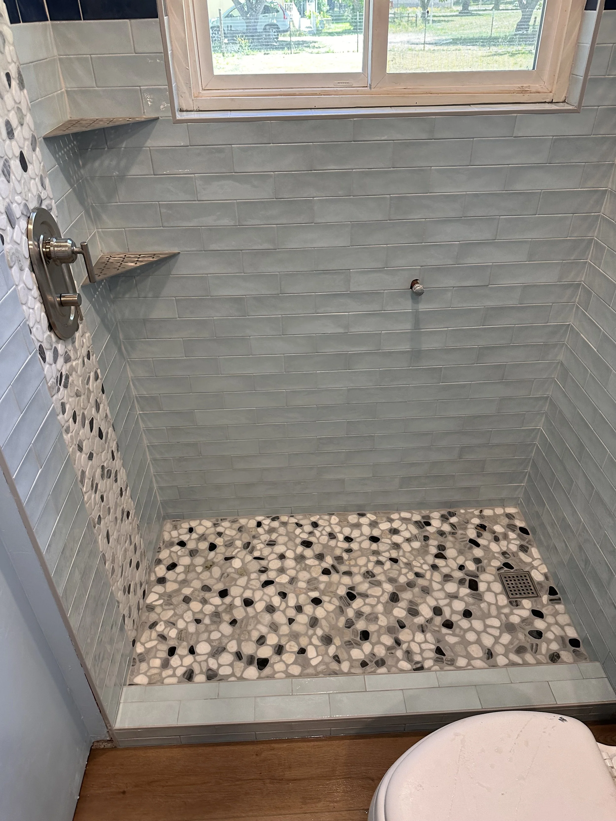 Tiled shower enclosure