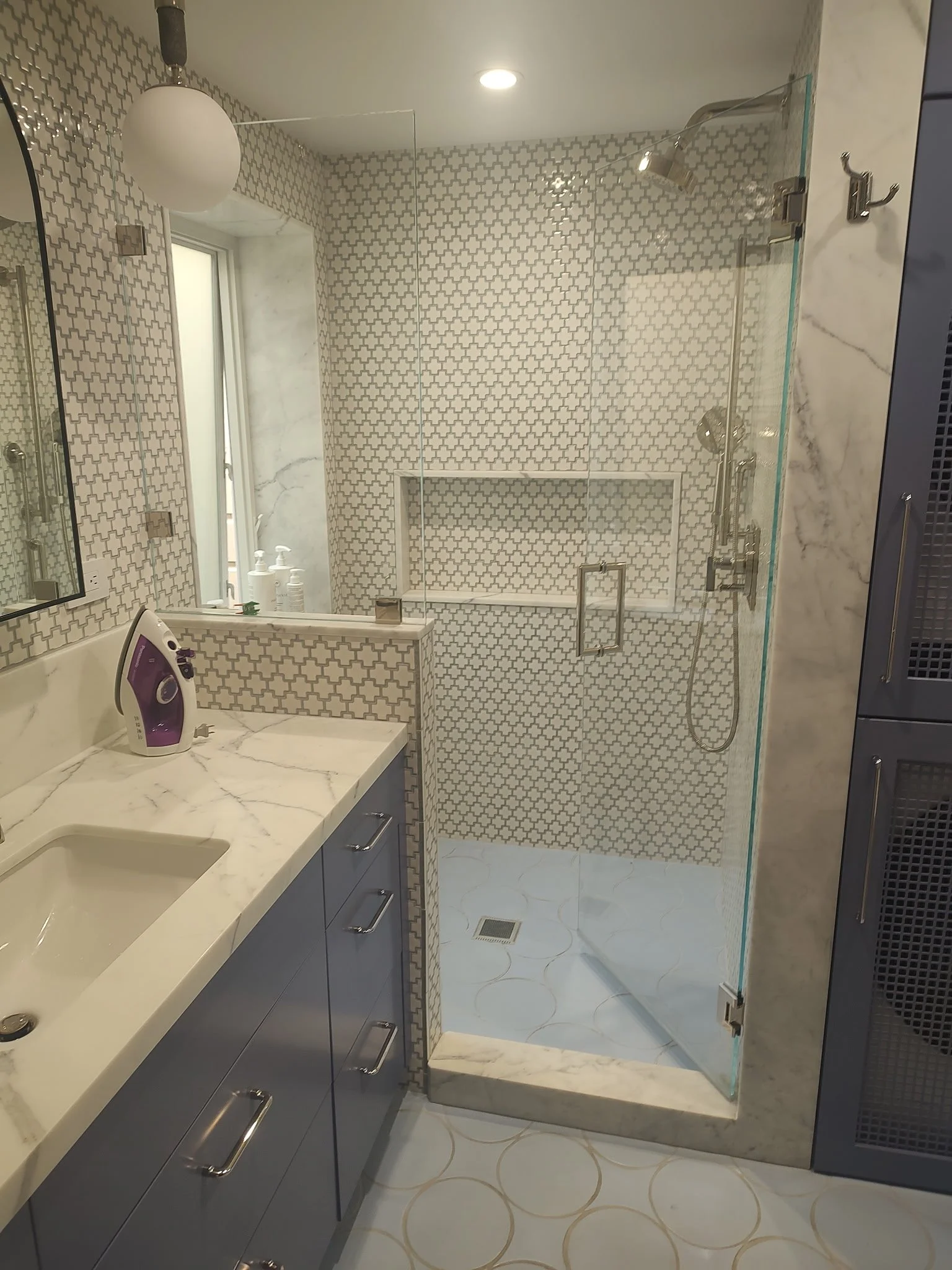 Tiled showe enclosure & installed new vanity