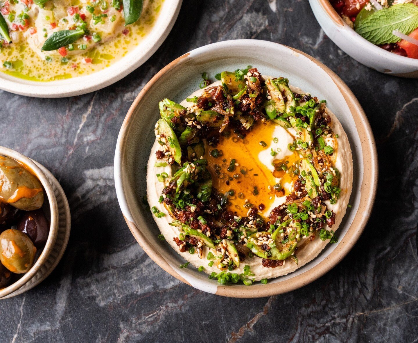 Airy and decedent. Whipped hummus, asparagus, sujuk, toasted sesame.⁠