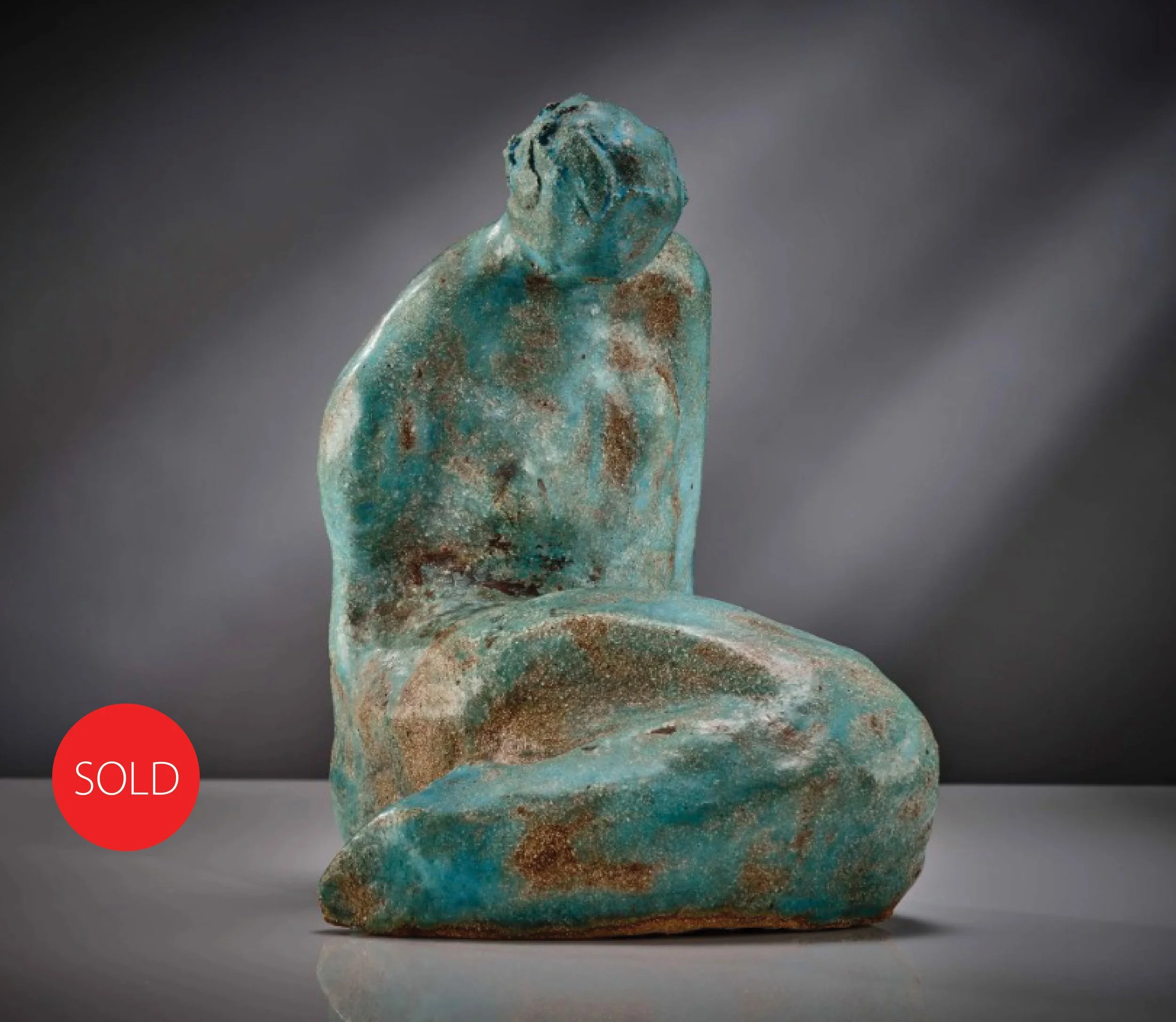 Crouched woman sold.jpg