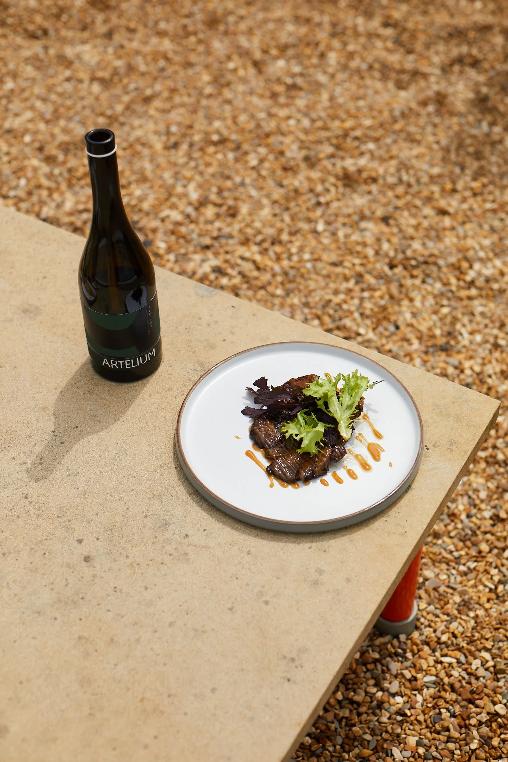 Artelium Pinot Gris 2023 paired with oyster mushroom steak enjoyed on the terrace 