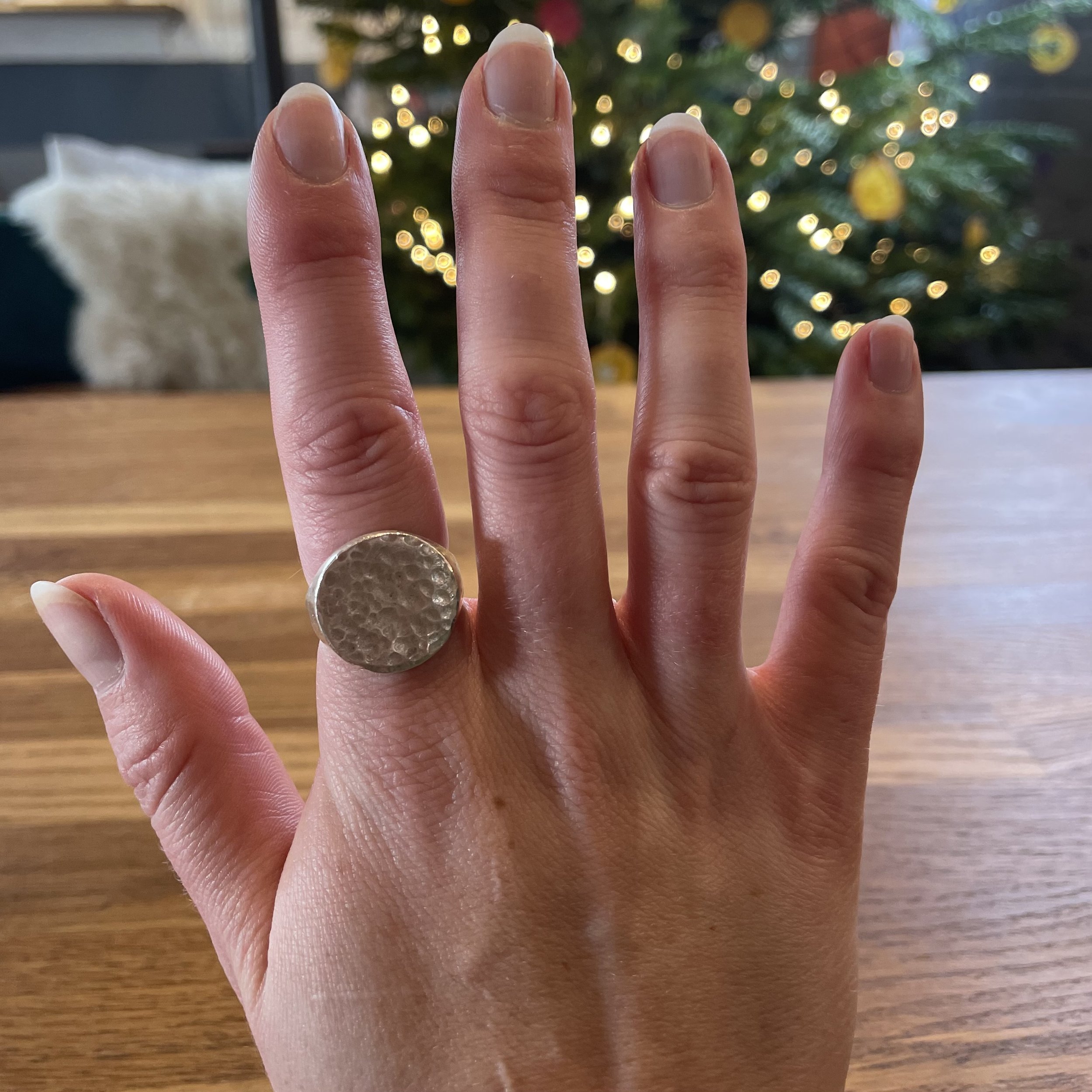 Silver round-faced, hammered ring by Oriana Jewellery.jpeg