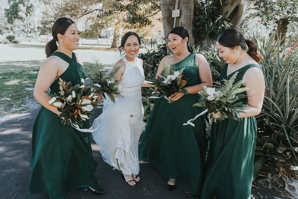 bridal party with flowers at sydney botanic gardens by jonathan david photographer