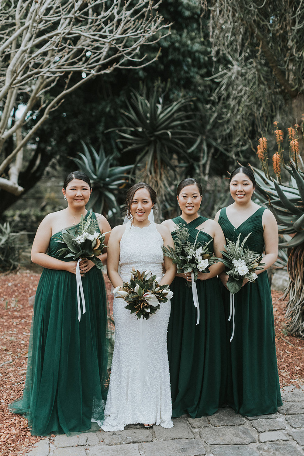 bridal gang with bouquets at sydney botanic gardens