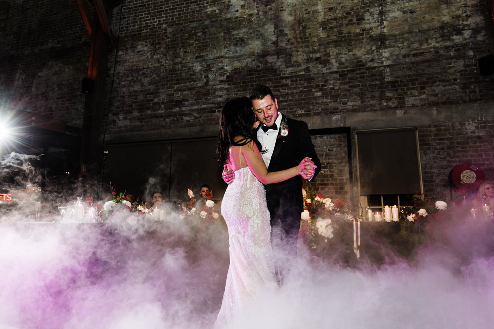 couple on dance floor with smoke at bar m sydney