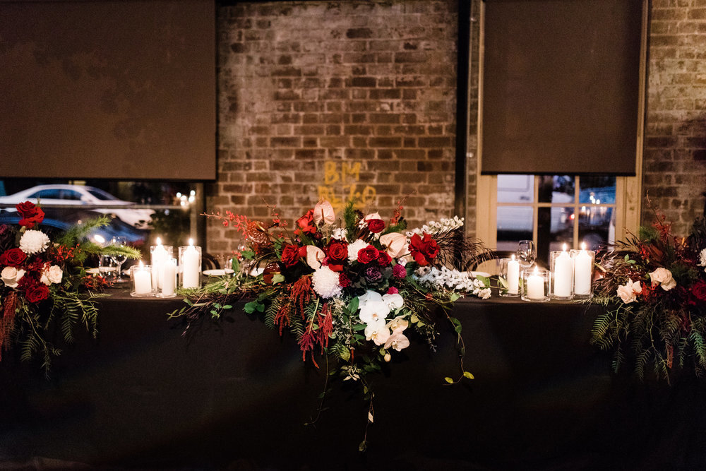 candles and flowers for wedding reception at sydney venue bar m