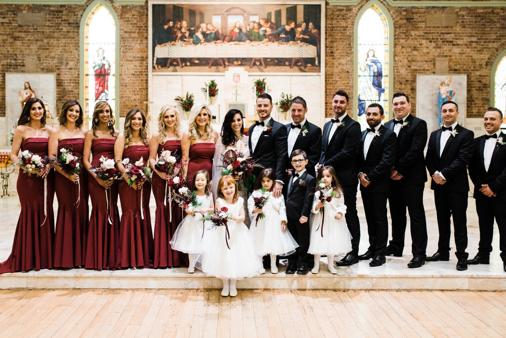full bridal party with bridesmaids and groomsmen in sydney church ceremony