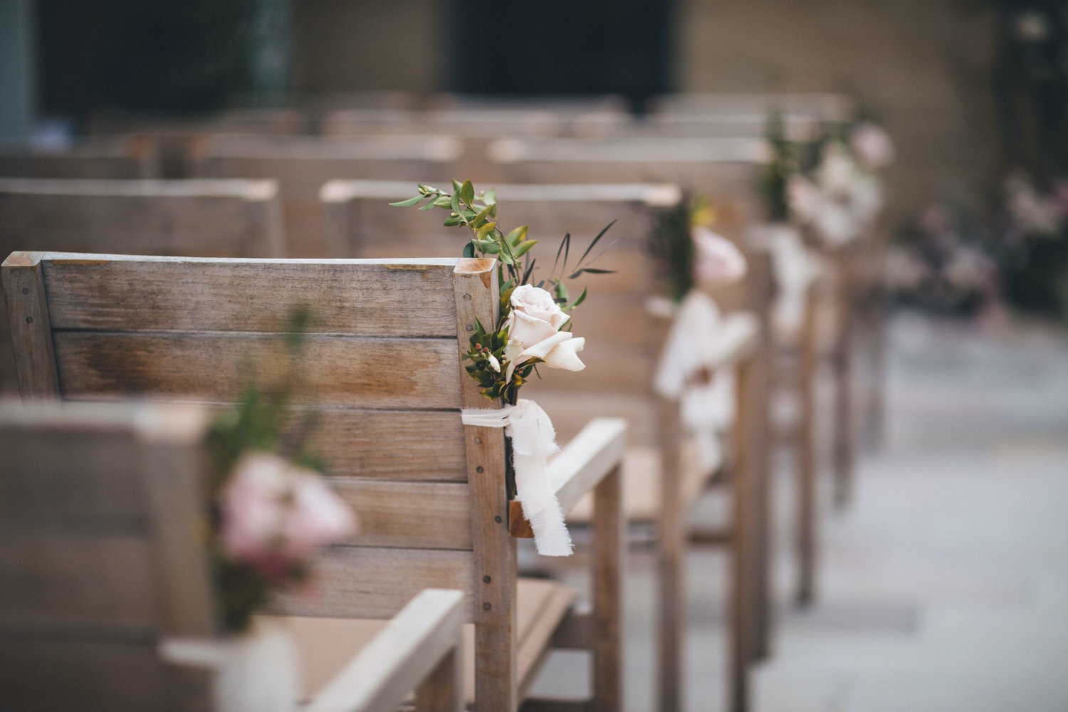 chair aisle pews flowers for gunners barracks ceremony