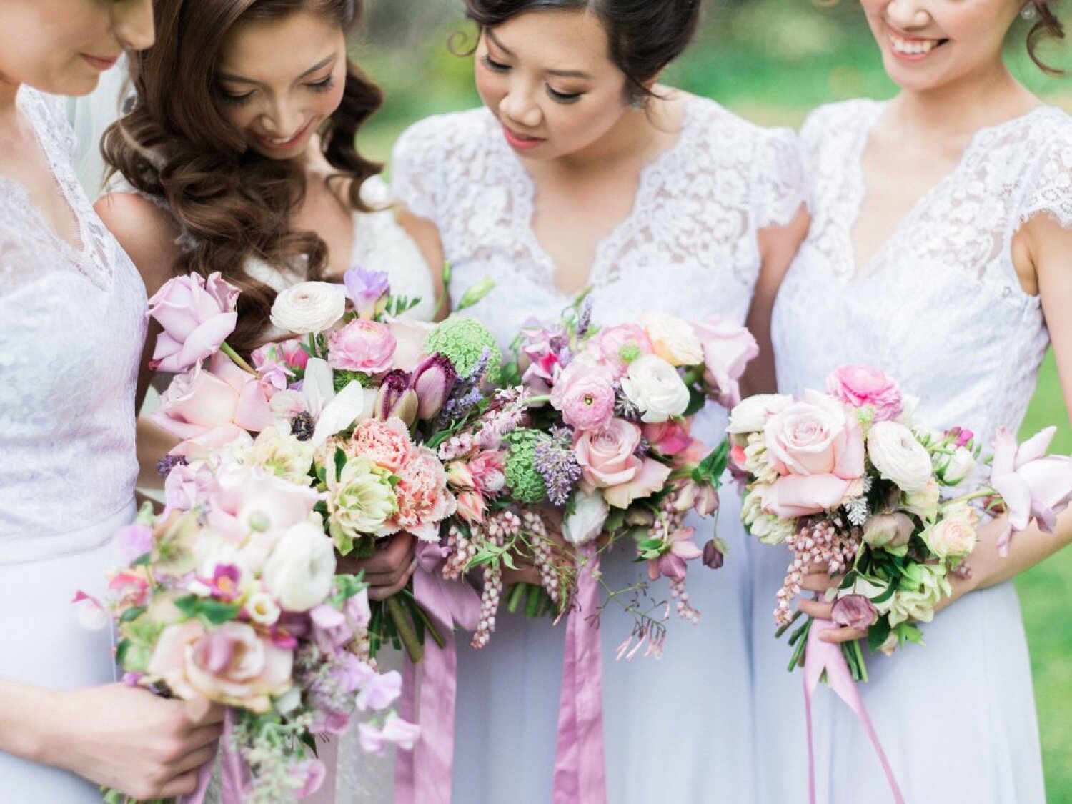 bride with bridesmaids holding bouquets at milton park bowral