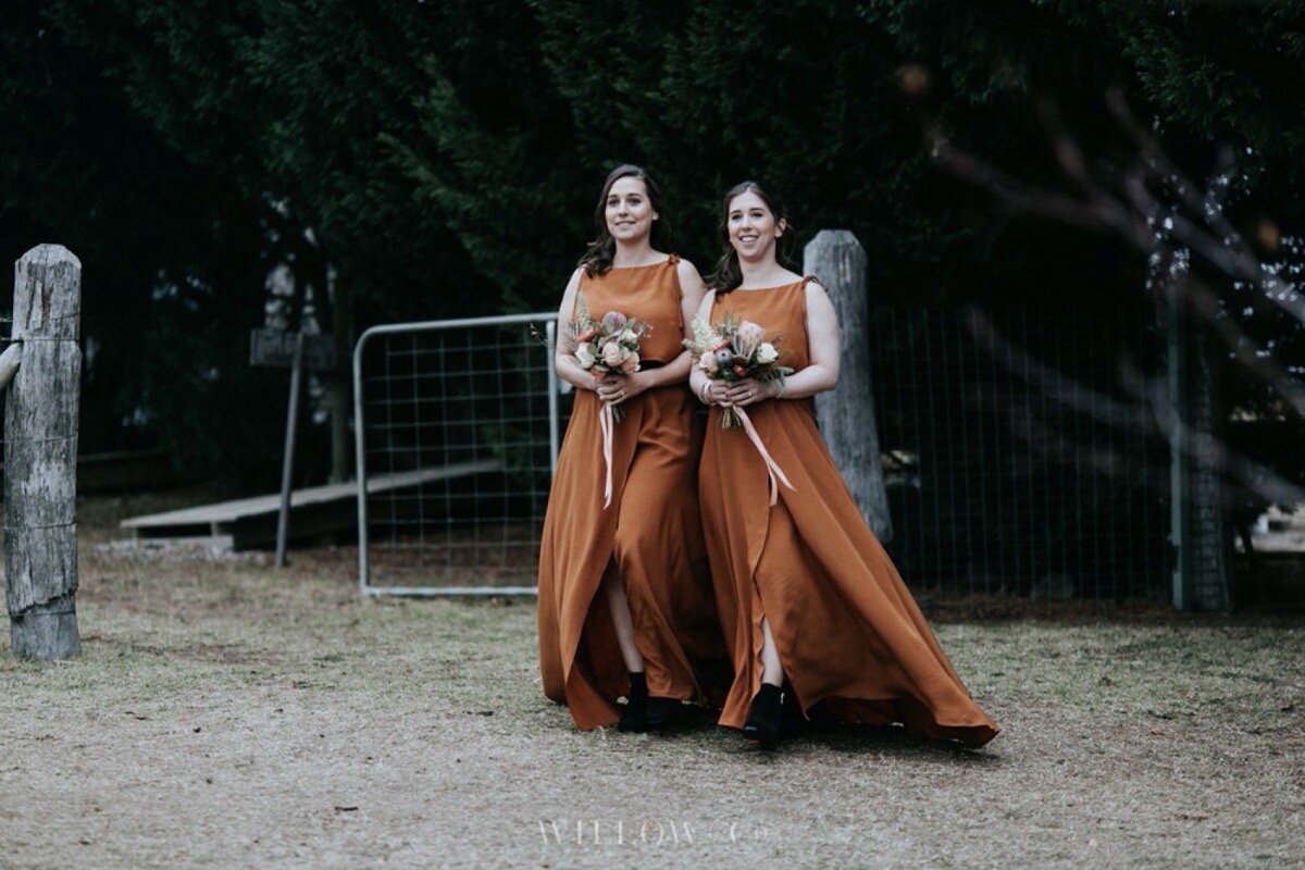 terracotta bridesmaids dresses by leave her wilder from love marie bridal boutique