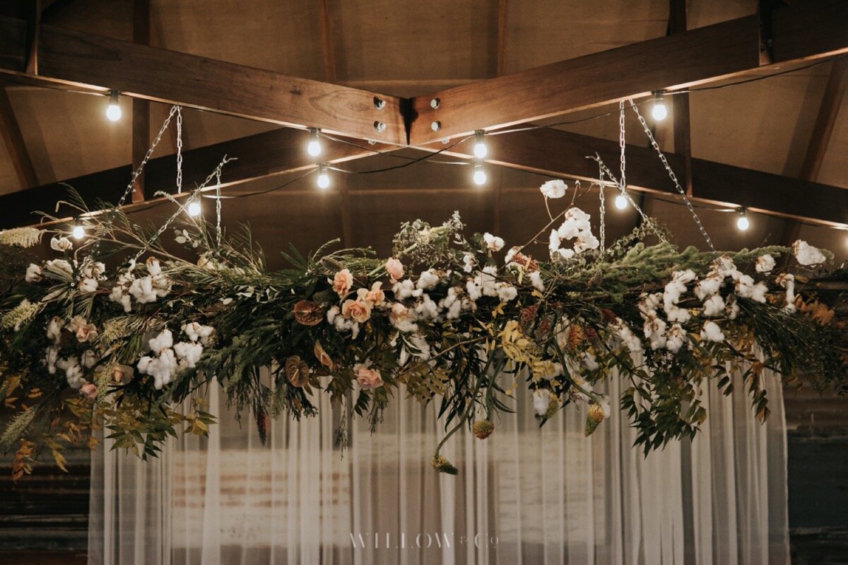 beautiful floral wedding ceiling installation at seclusions blue mountains