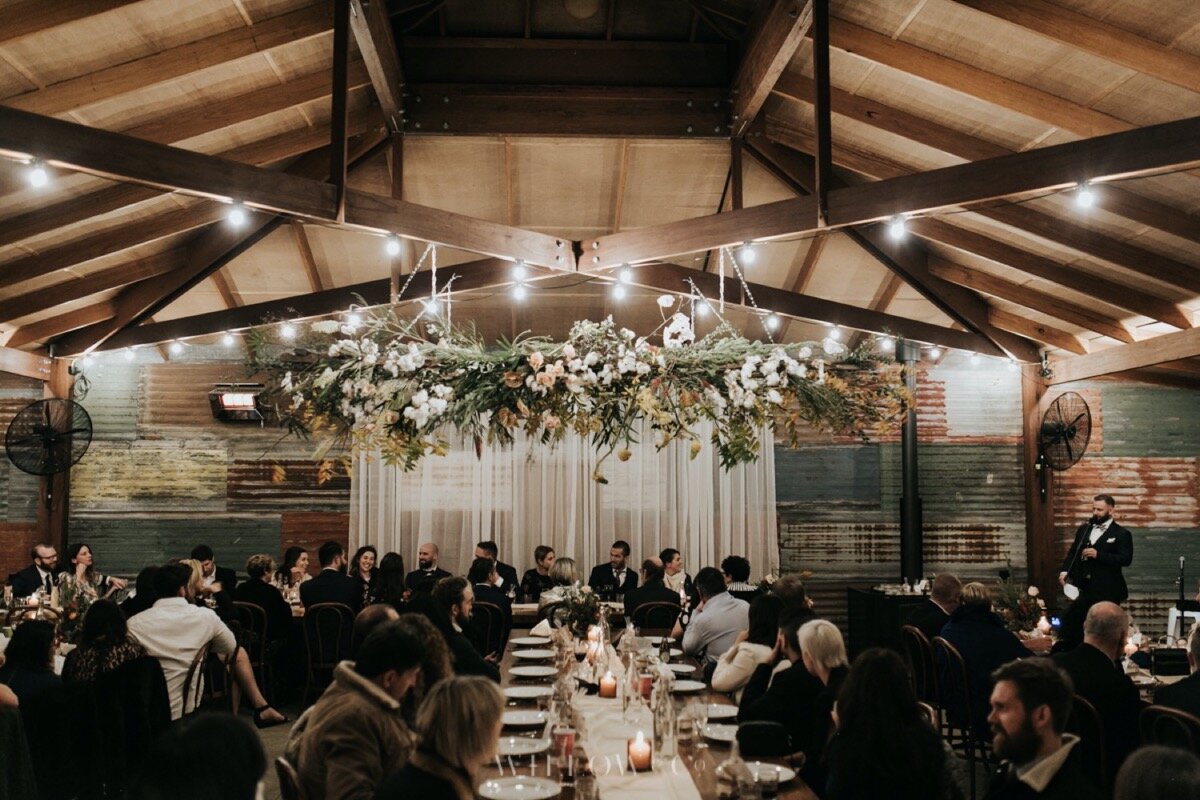 barn style rustic wedding venue blue mountains with floral installation