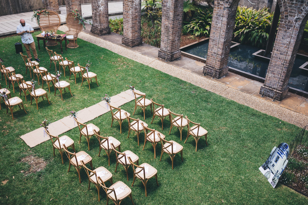 wedding ceremony set up with simply seated at paddington reservoir gardens