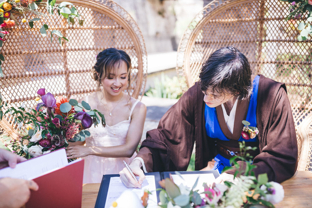 signing with celebrant at garden wedding venue sydney