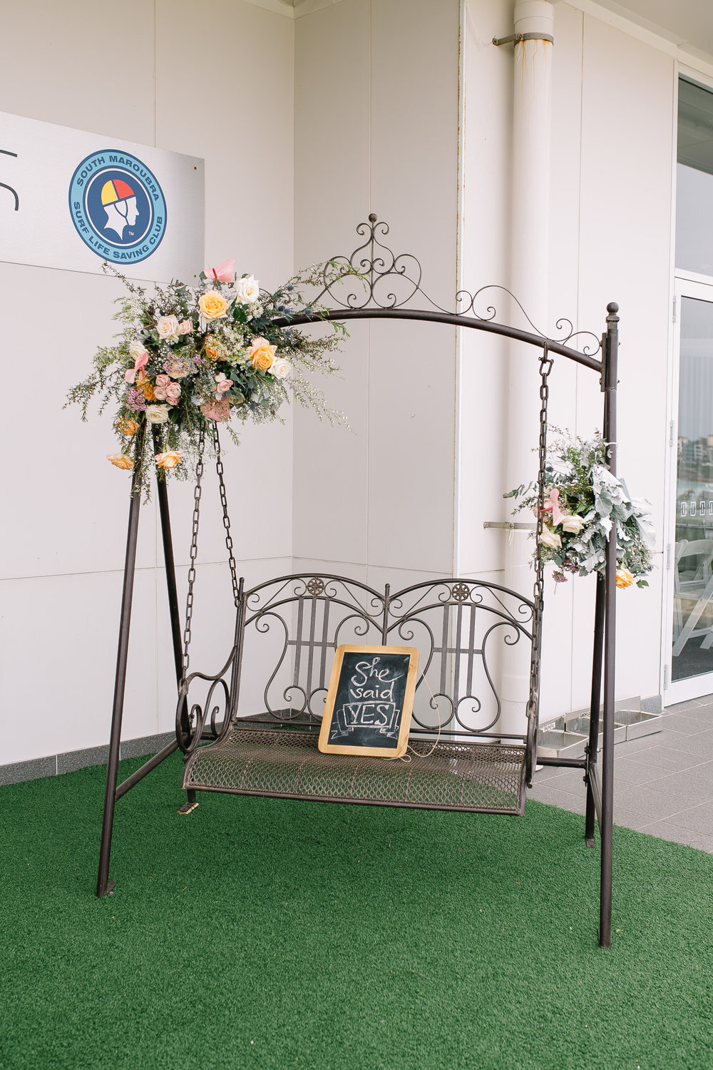 ornamental swing decorated with flowers at south maroubra slsc