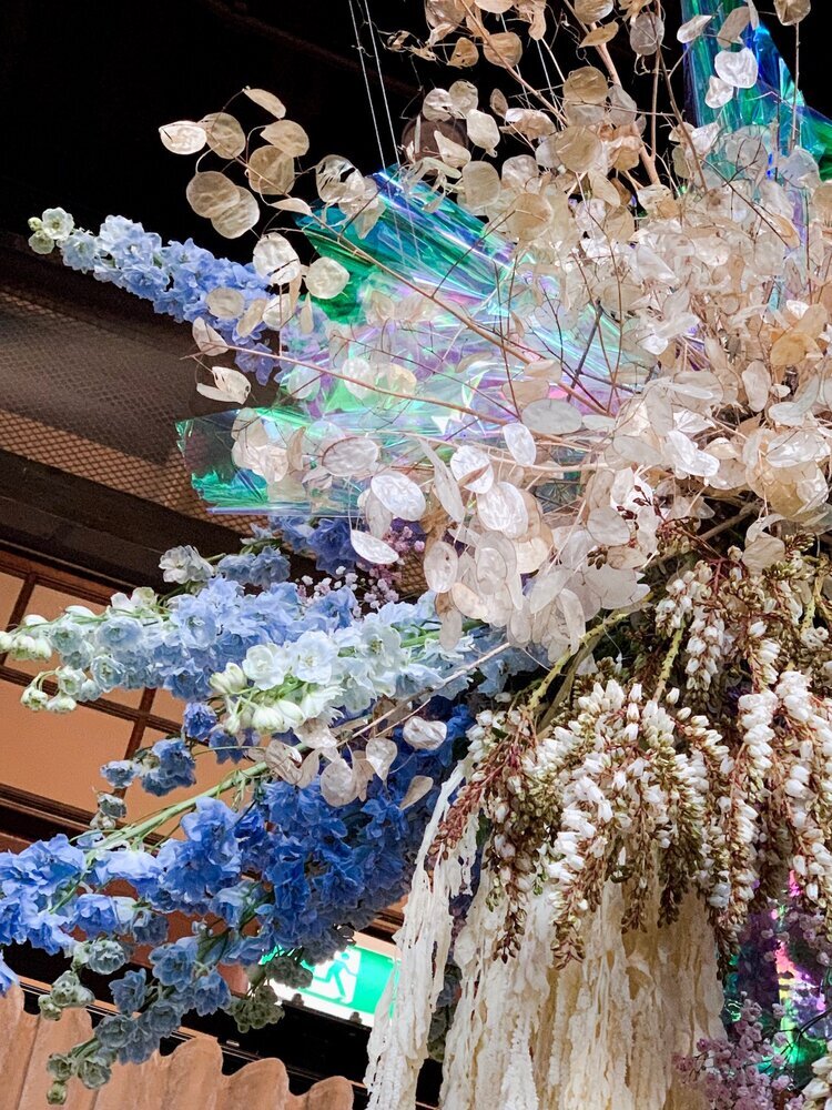 lunaria blue and iridescent floral installation at ovolo ceiling in piper room