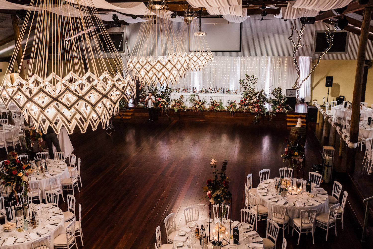 chandeliers and dance floor view at ottimo house by captured frames