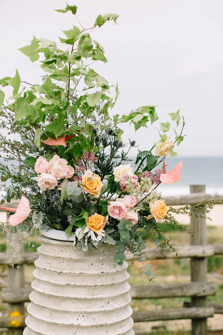 ceremony backdrop flowers at south maroubra slsc horizons