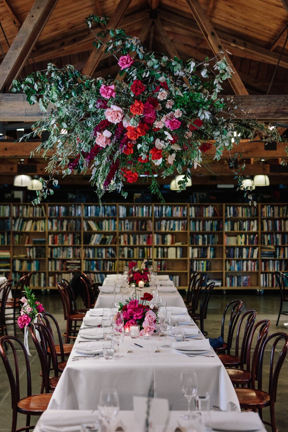 Floral installation ceiling bendooley book barn lime tree bower