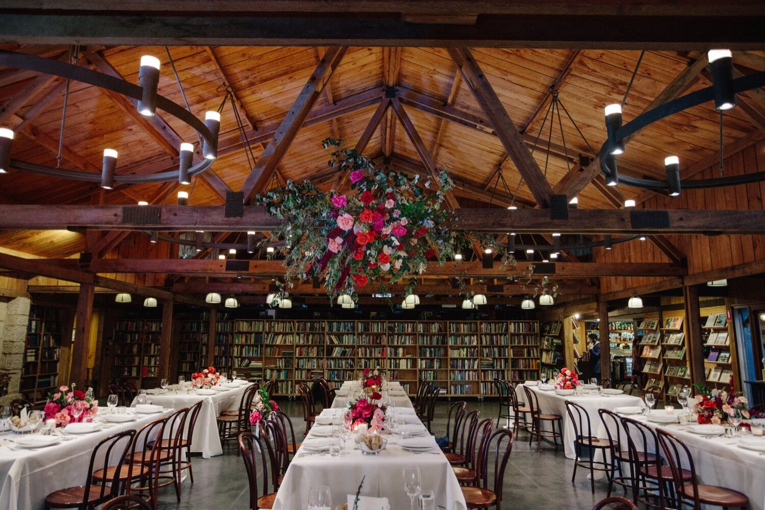 Floral installation ceiling bendooley book barn lime tree bower