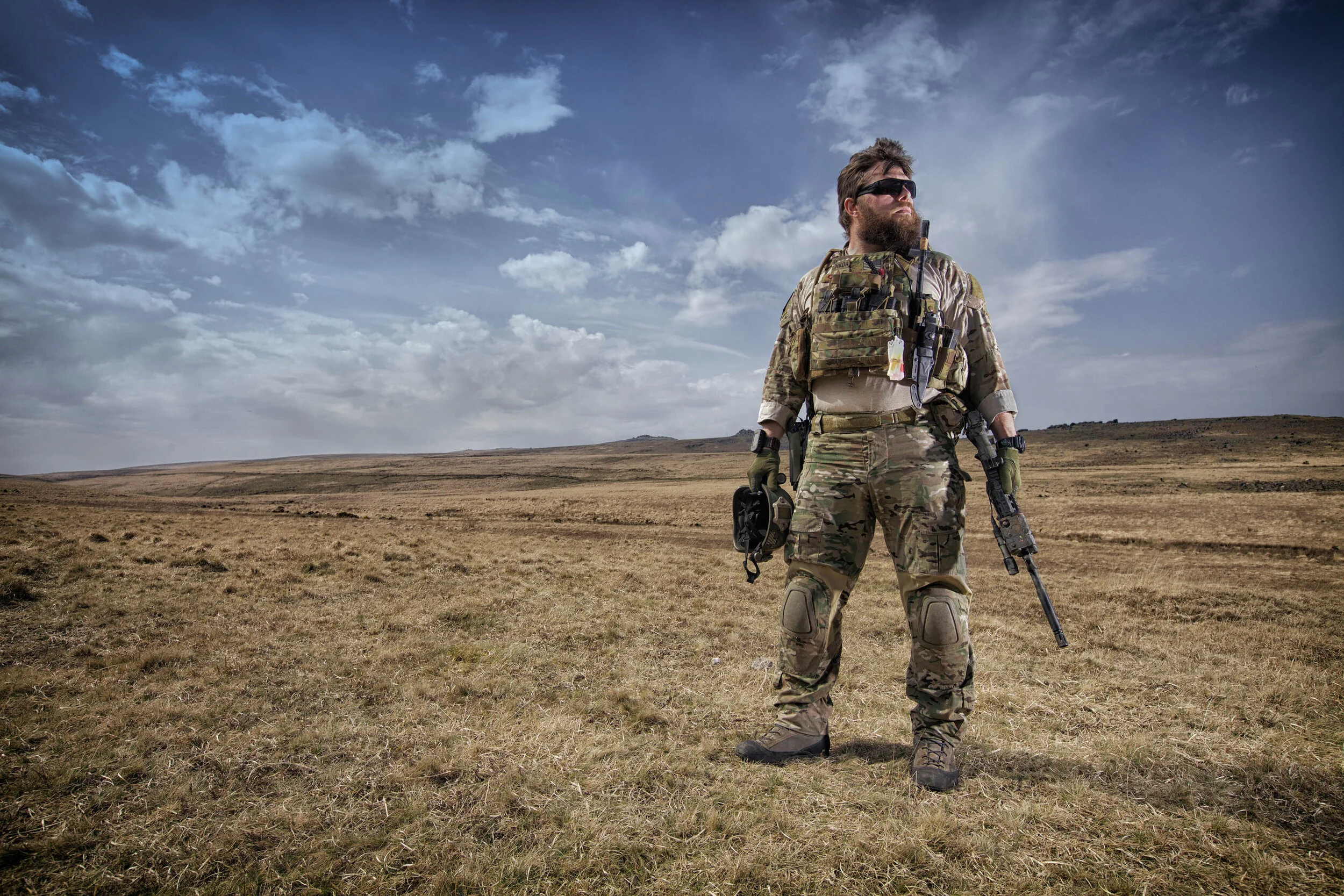 Special Forces soldier in open fields in Multicam Uniform & T3 Gear Plate Carrier