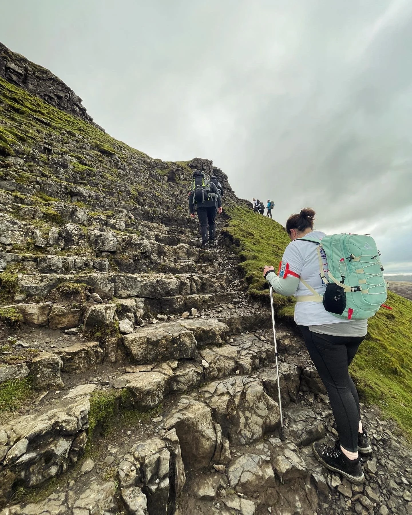 hiker on the steep ascent of pen y ghent - yorkshire three peaks guided walk