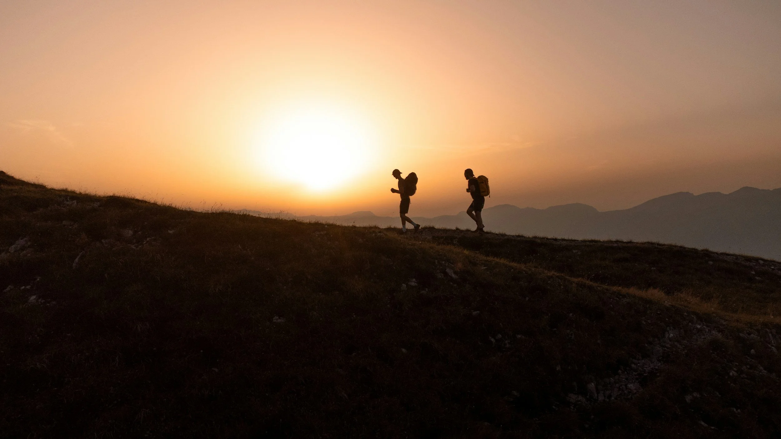 Group walking Scafell Pike with professional mountain leader